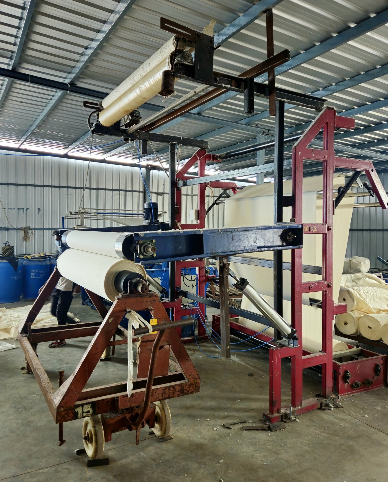 Grey Fabric Roll Unrolling Machine